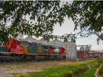 FXE ES44AC and CSX AC4400 Locomotives leading a train